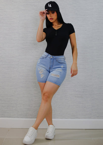 Stretchy Mid Rise Mid Thigh Ripped Light Denim Shorts