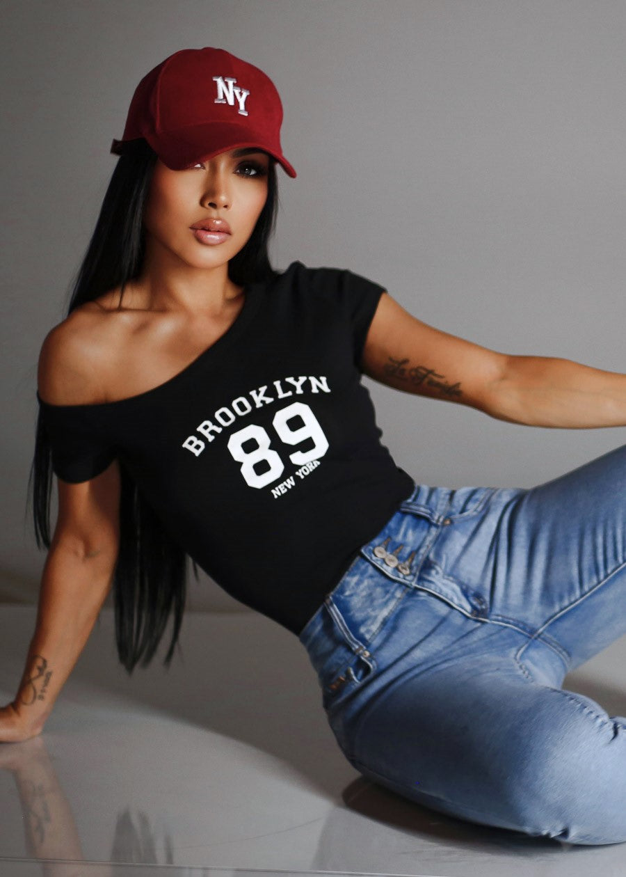 Asymmetrical Neckline Stretch Graphic Top Black 