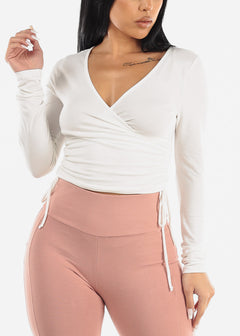 White Long Sleeve Surplice Crop Top w Ruched Sides